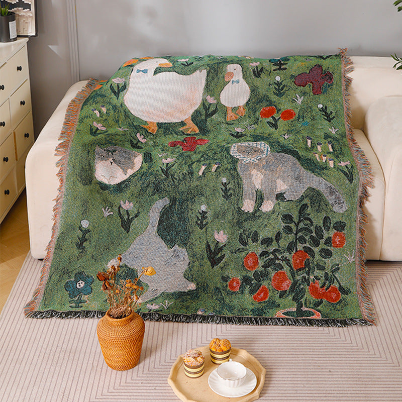 Knitted tassel tapestry throw with little cat print - detail view
