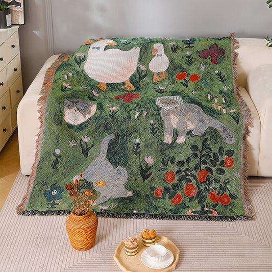 Knitted tassel tapestry throw with little cat print - detail view