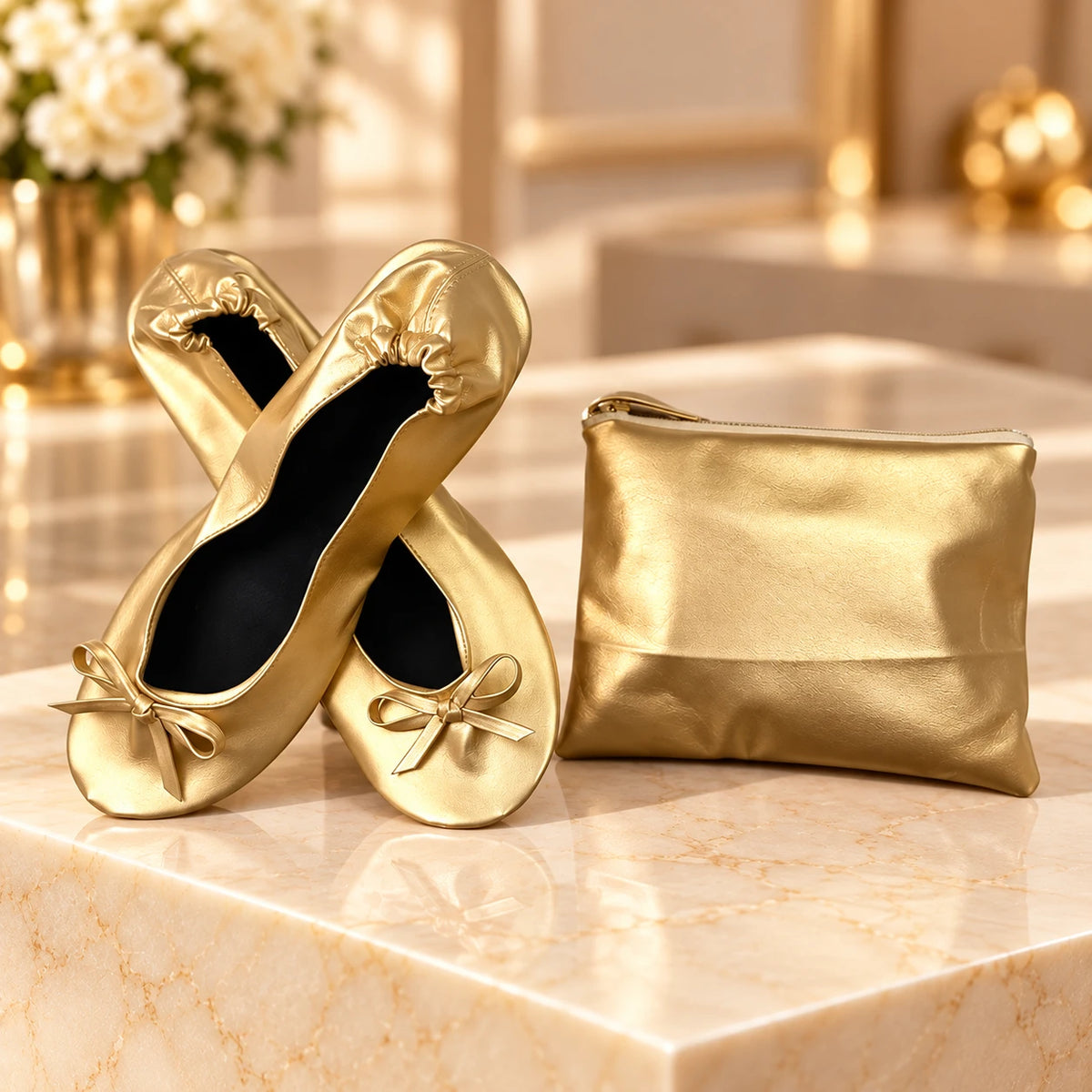 Gold foldable ballet flats with bow and matching zip pouch