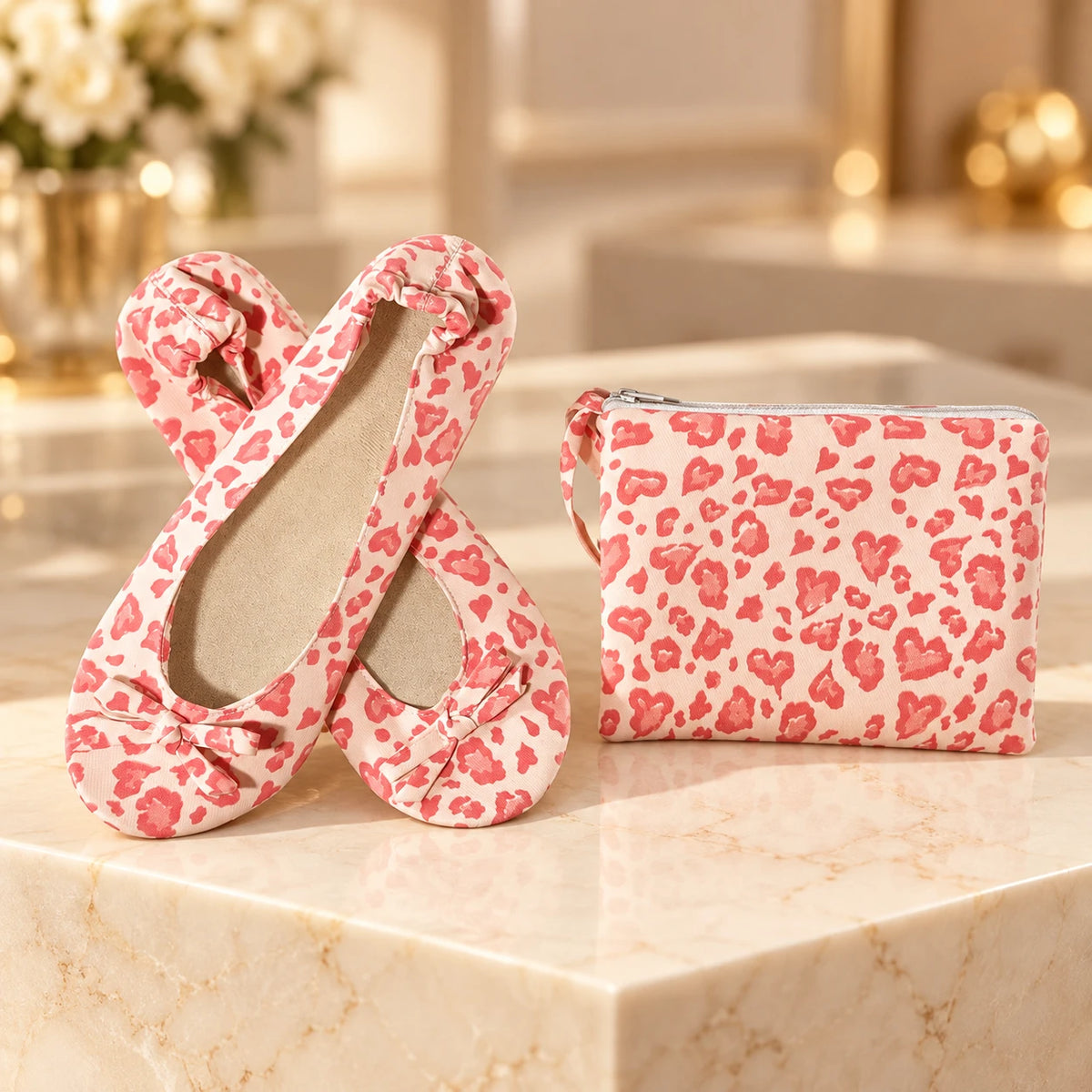 Pink leopard print foldable ballet flats with matching zip pouch