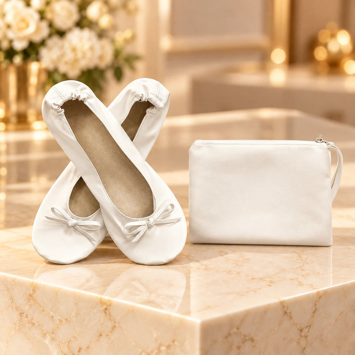 White foldable ballet flats with bow and matching zip pouch