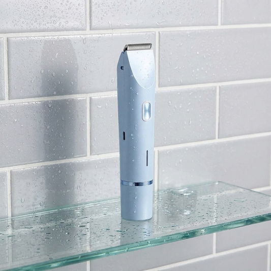 Trimmer on glass shower shelf