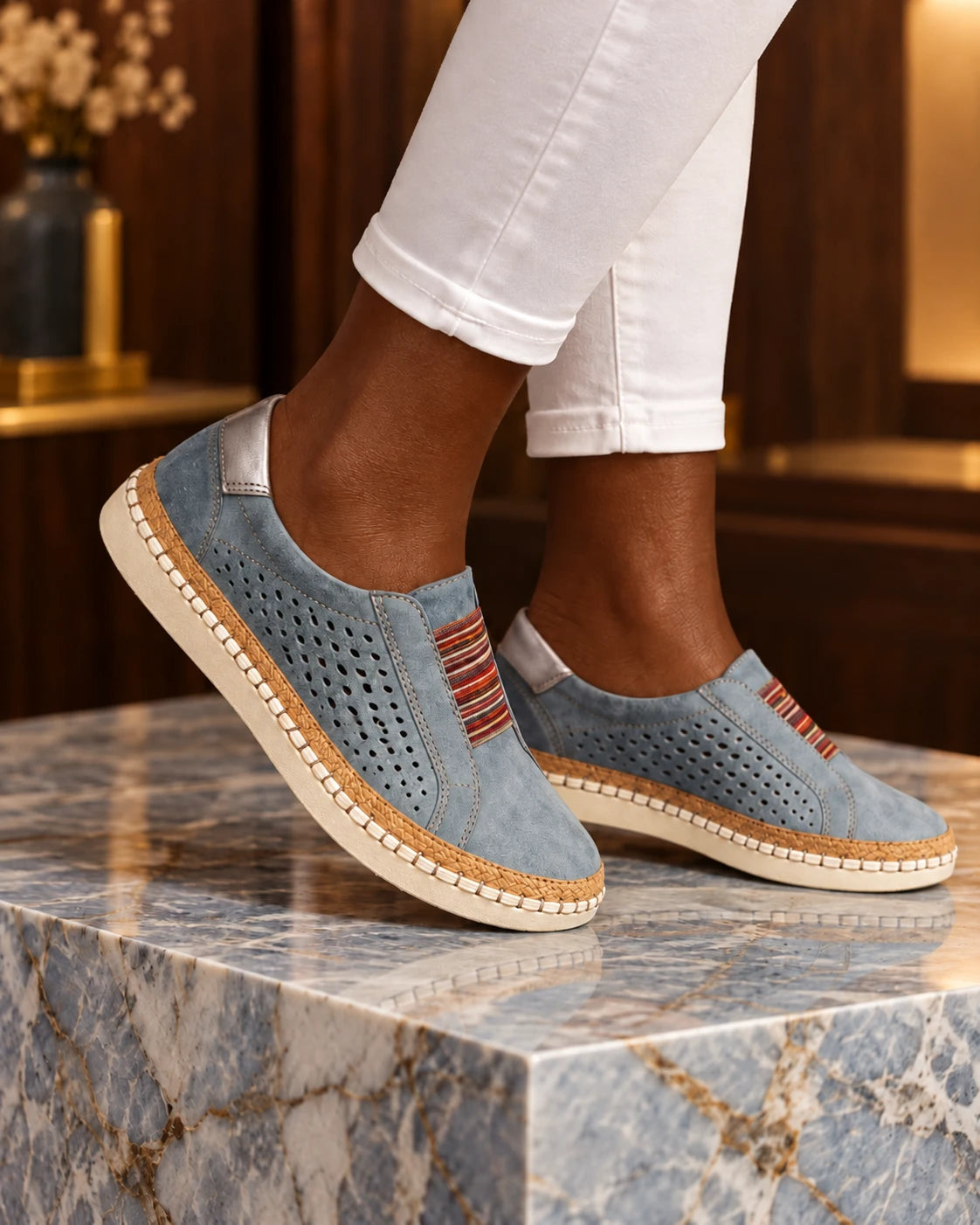 Blue low-top casual slip-on shoes with striped sole
