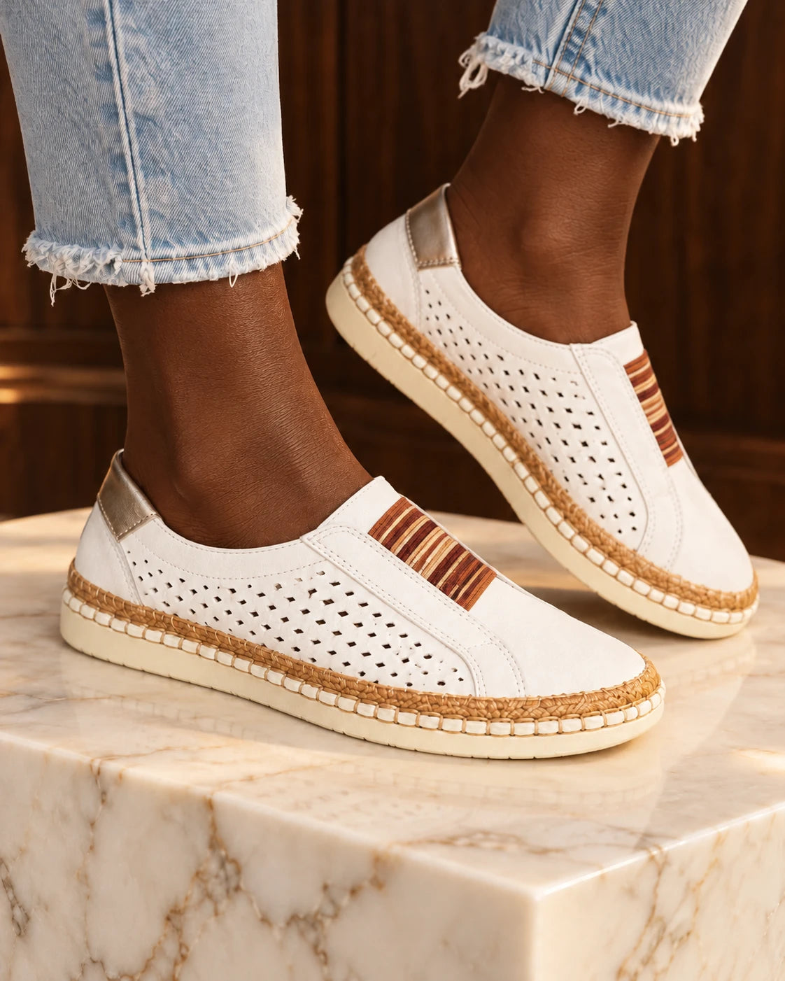 White low-top casual slip-on shoes with striped sole