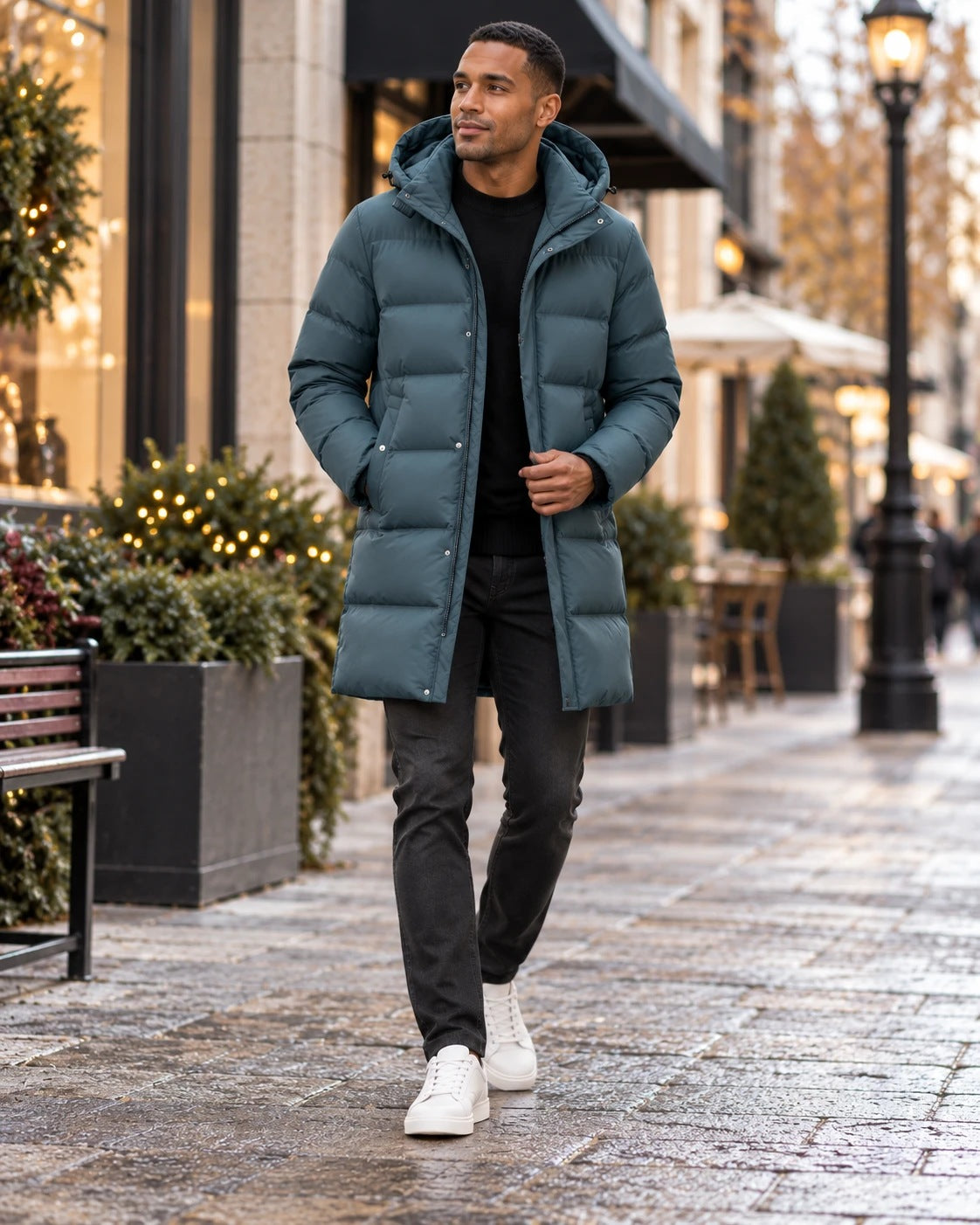 Men's down jacket in shrimp cyan, worn by a model